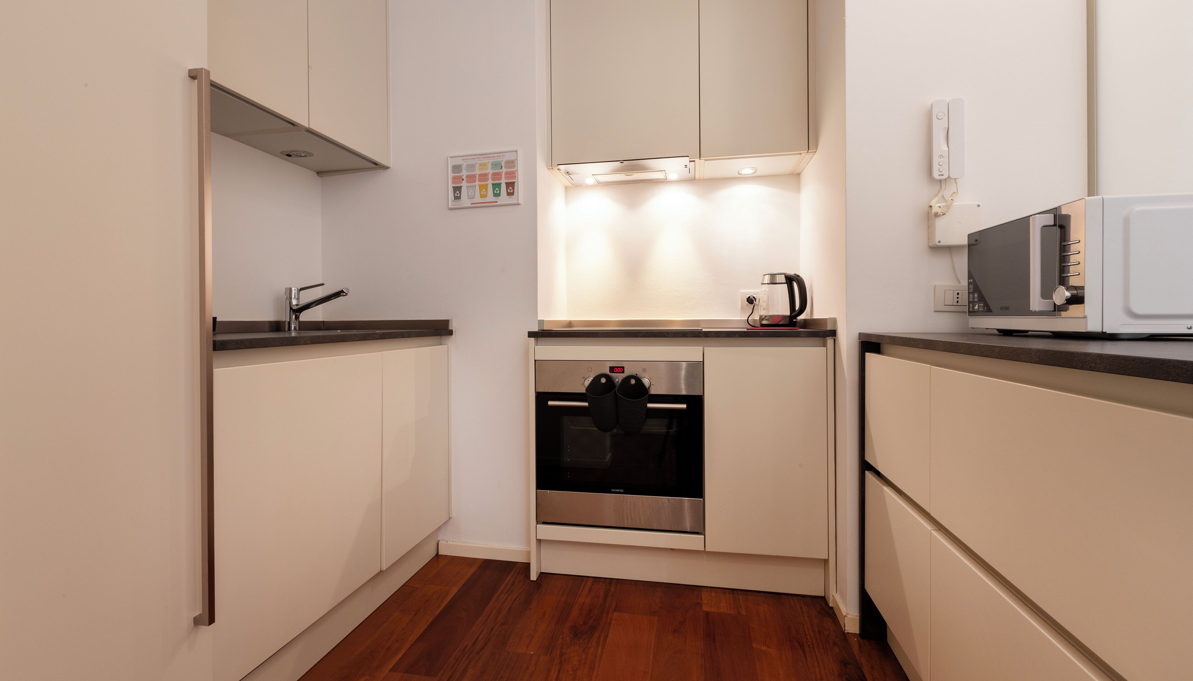 Apartamento (2 Bedrooms) | Cocina privada | Microondas, horno, placa de cocina y lavavajillas