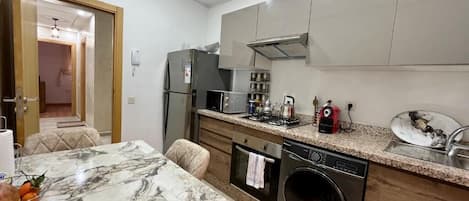 Apartment, Balcony, Garden View | Private kitchen