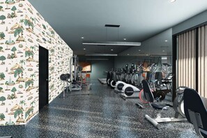 A gym with treadmills, ellipticals, and weight machines. - Close to American Airlines Center + Dining & Pool (Dallas)