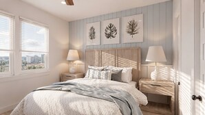 Ein Schlafzimmer mit einem Bett, Nachttischen, einem Fenster mit Jalousien und Wandbildern.