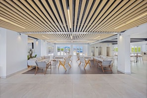 This spacious lobby welcomes you with modern Scandinavian-inspired design, warm wood accents, and comfortable seating where you can relax after your day's adventures.