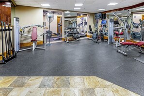 A gym with various exercise equipment, including treadmills, weight machines, and free weights. - Ski-In/Out Beaver Creek Condo w/Amenities (Beaver Creek)