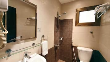 Suite, 1 Bedroom | Bathroom | Shower, hair dryer, towels, soap
