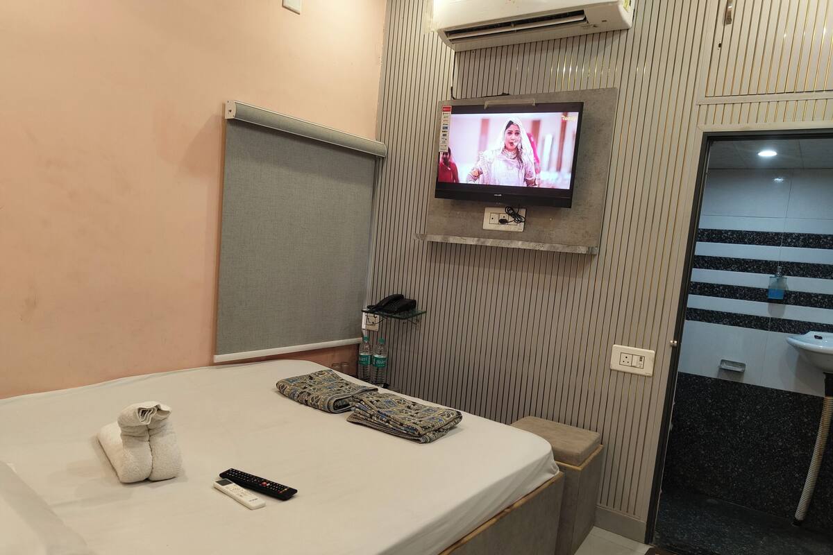 Desk, laptop workspace, blackout drapes, soundproofing