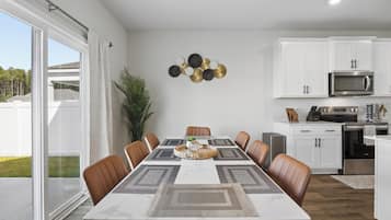Dining area and slider to the back patio