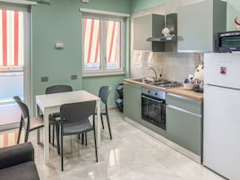 Apartment, Balcony, City View | Private kitchen