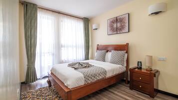 Desk, iron/ironing board, travel crib, WiFi (free)