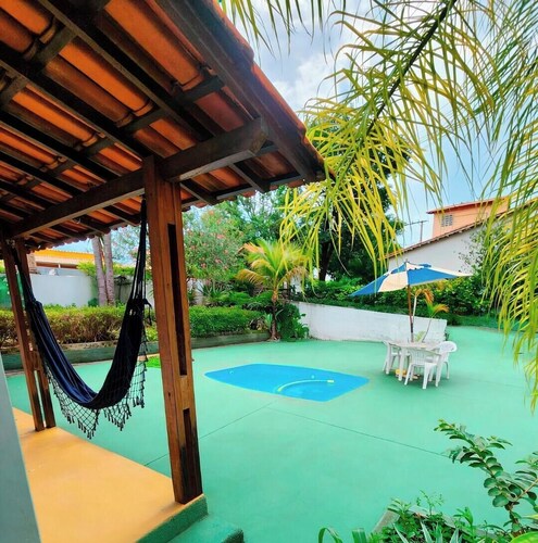House with 5 bedrooms, swimming pool, on the street by the dam, waterfall and club in Tres Marias MG.