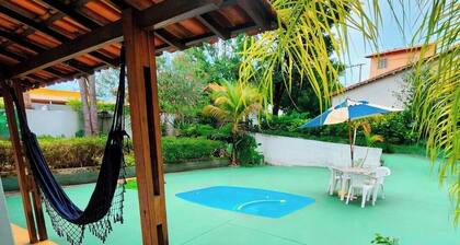 House with 5 bedrooms, swimming pool, on the street by the dam, waterfall and club in Tres Marias MG.