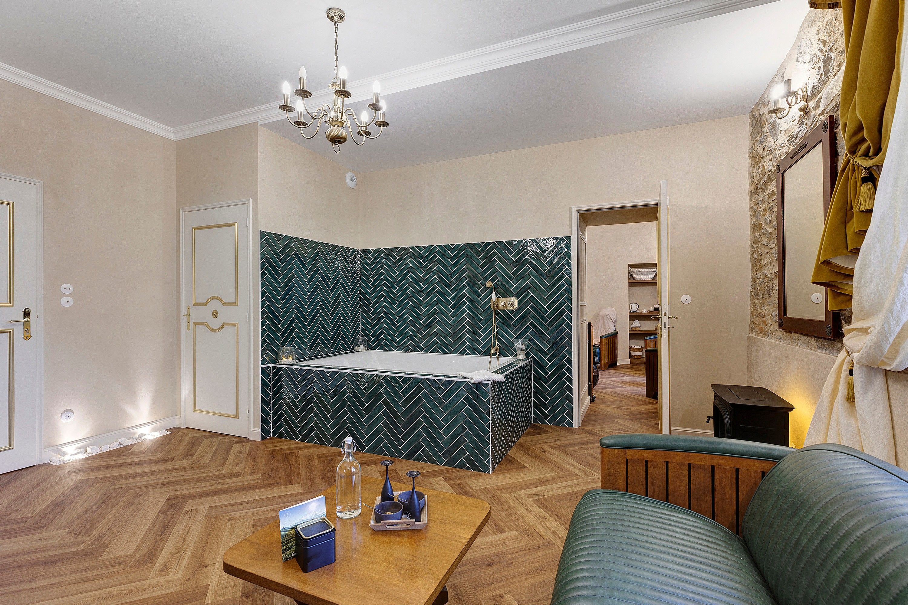 A modern bathroom with a freestanding bathtub, a shower, and a vanity.