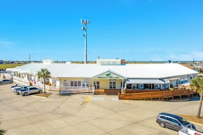 Jamaica Village shopping center offers a pizzeria, coffee & wine bar, hardware store, liquor store and washateria. - Pet Friendly Canal Home w/ Top Level Viewing Deck,  Boat Slip & More! (Galveston)