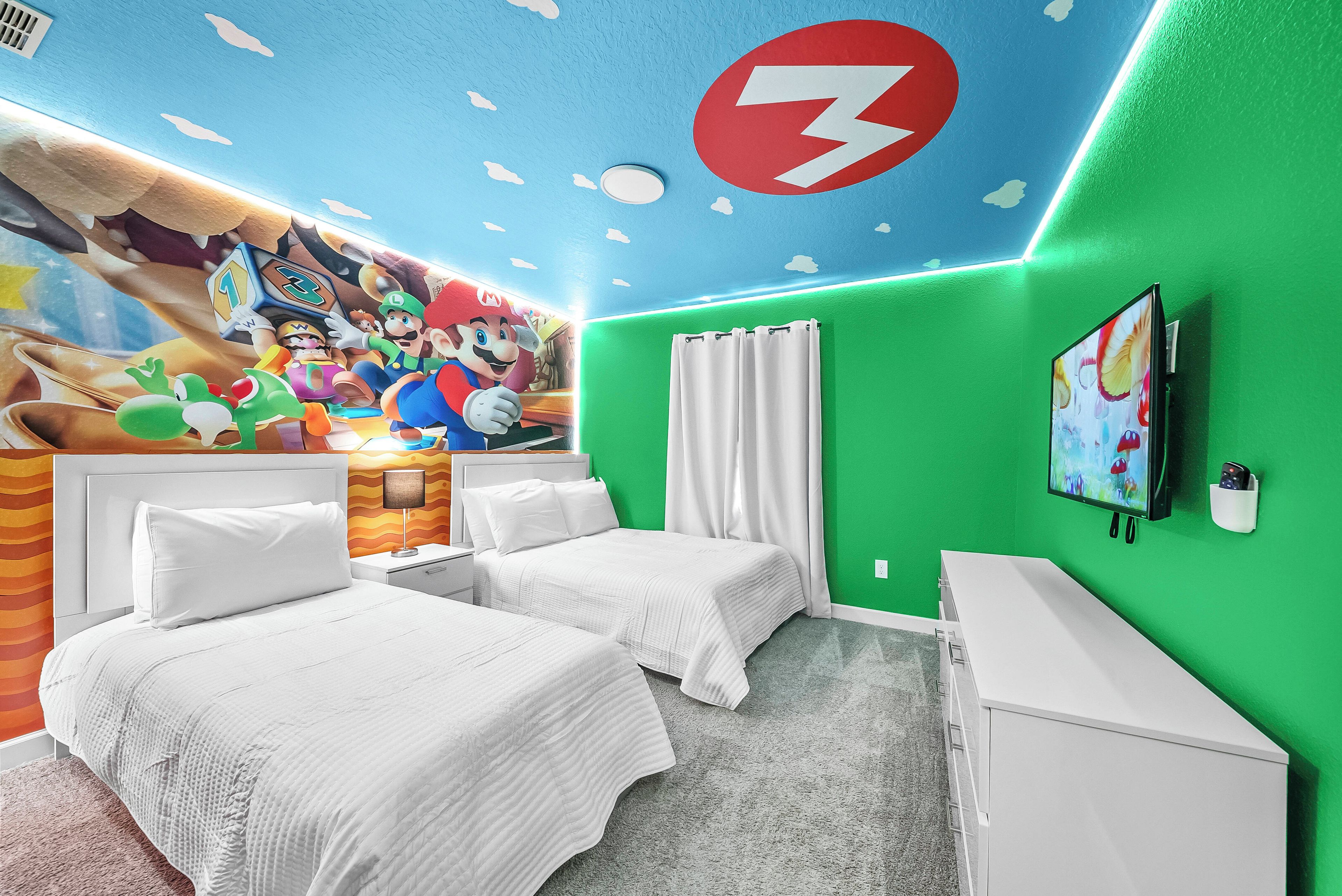 A bedroom with two beds, a mural, a green wall, and a ceiling with a lightning bolt symbol.