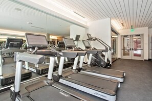 A gym with treadmills, stationary bikes, and elliptical machines. - Escape to Trendy & In Vogue 2 BR Tempe Town Lake (Tempe)