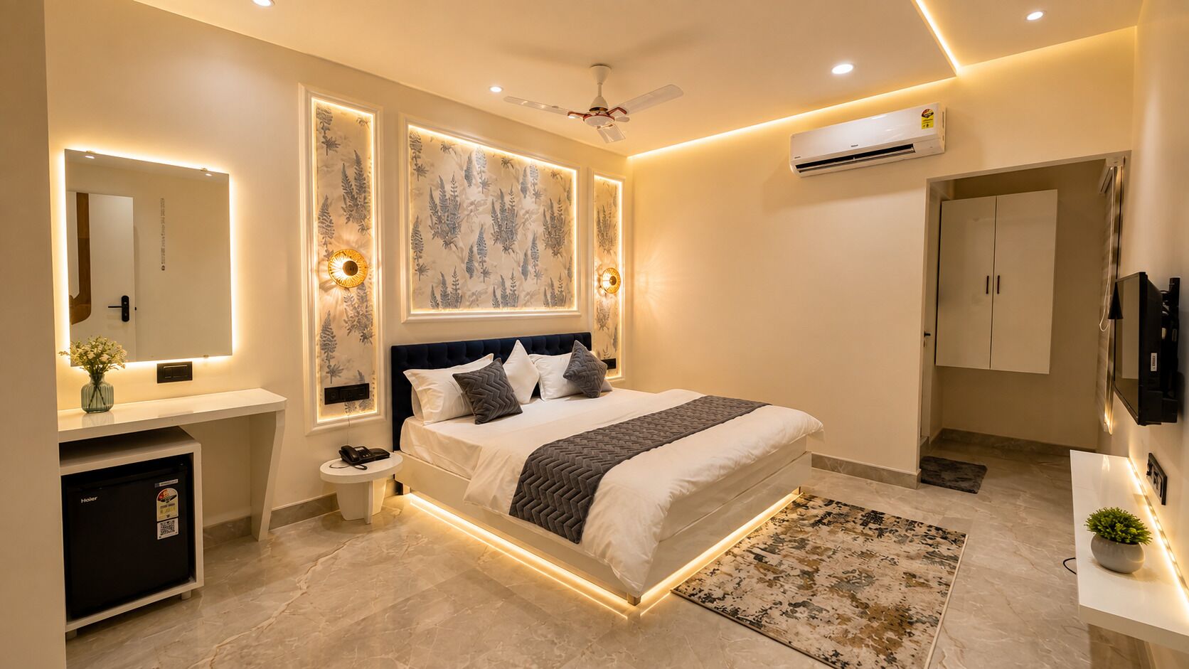 A modern bedroom with a bed, bedside tables, a mirror, and an air conditioning unit.