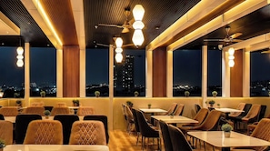 Outdoor dining - Erleen Hotel & Rooftop Restaurant (Indore)
