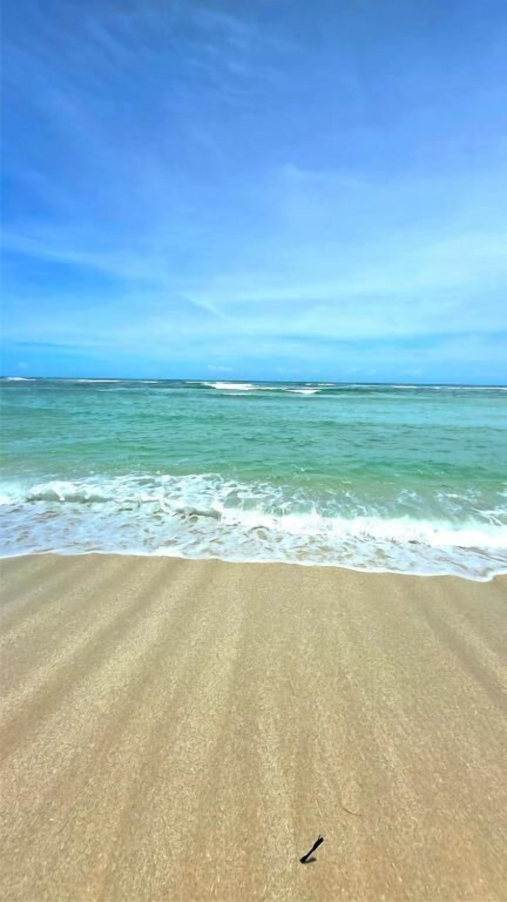On the beach, white sand