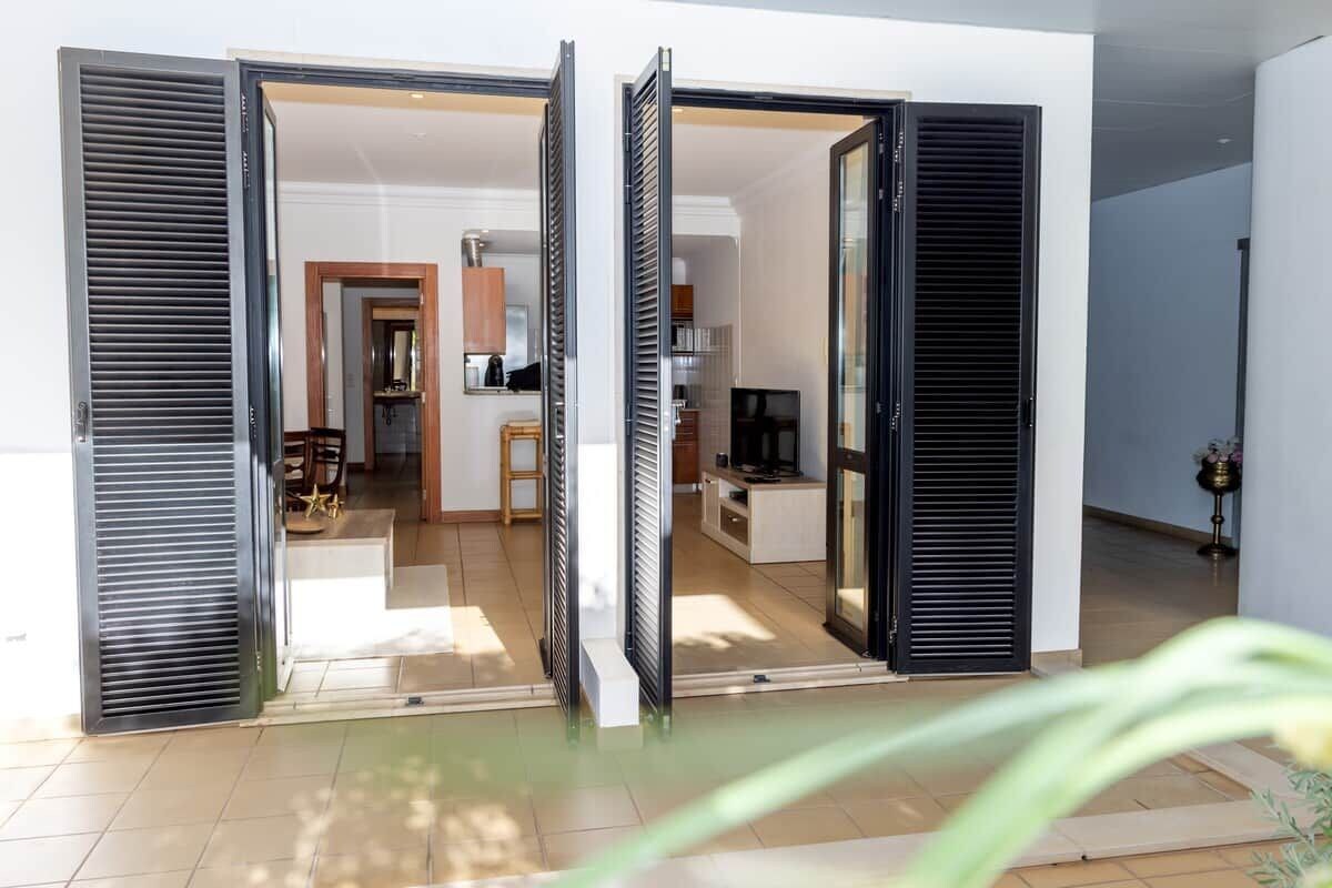 A modern interior with a kitchen, dining area, and living space.