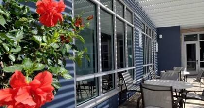 Two-Queen Studio Suite w/ Daily Breakfast + Pool