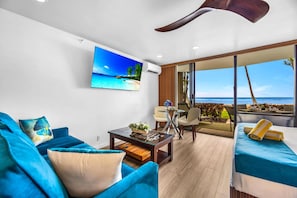 The living space naturally connects the inside with the outdoors - Valley Isle Villas | Oceanfront Studio | Car Incl. w/ 6+ Nights | VIR-107 by KBM (Lahaina)