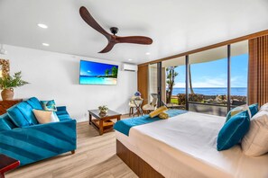 The recently updated suite offers a king bed, flat-screen TV, and a ceiling fan to keep the trade winds moving - Valley Isle Villas | Oceanfront Studio | Car Incl. w/ 6+ Nights | VIR-107 by KBM (Lahaina)