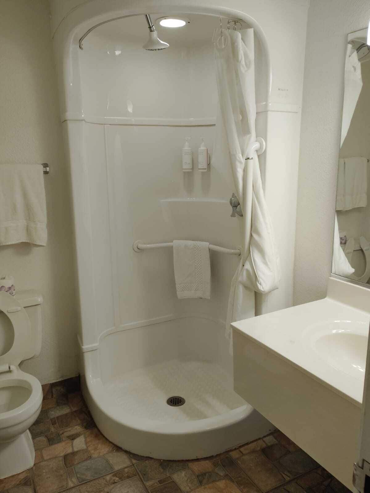 Shower, towels, soap, shampoo