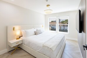 Design Apartment, 1 Bedroom, Kitchen, Partial Ocean View | Laptop workspace, blackout drapes, iron/ironing board, WiFi (free) - Octa Collection on Front Beach (Panama City Beach)