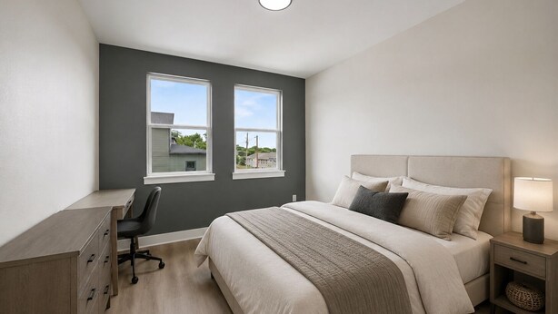 A bedroom with a bed, bedside table, lamp, desk, chair, and two windows. - New Furnished 3BR 31+ Day Stay Corporate and Family Friendly Garage + Wi-Fi (Fort Worth)