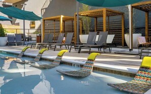 A poolside area with lounge chairs and umbrellas. - 2bed/2bath Midtown-Atlanta
Secure Parking
Walking Distance to Retail Shops (Atlanta)