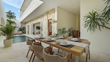 Vila, 3 quartos, vista para o resort | Sala de jantar