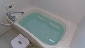 Deluxe Room | Bathroom | Separate tub and shower, free toiletries, hair dryer, slippers