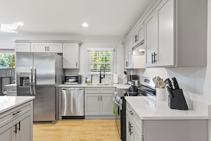 Private kitchen - 4BR/3BA Modern GVL Retreat, Fire Pit + Fence (Greenville)