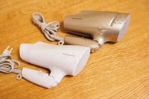 Two Panasonic hair dryers on a wooden surface. - Just a short walk from the Shinsaibashi Glico Sign (1 min), Dotonbori (30 seconds), Kuromon Market, Namba Station, Dotonbori, and Ran no Kaku (Osaka)
