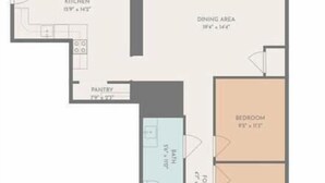 Plano de planta que muestra una sala de estar, comedor, cocina, baño y dos dormitorios.