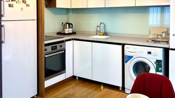 Coffee/tea maker, fridge, microwave, oven