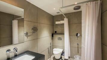 Deluxe Room | Bathroom | Shower, free toiletries, towels, soap