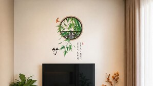 A modern living room with a flat-screen TV mounted on the wall, a wooden bench with storage, a potted plant, and decorative items. - The Ruby Ha Long by LN Maison (cao xanh)