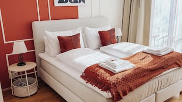 Apartemen Superior | Seprai premium, meja kerja, dan ruang kerja ramah laptop