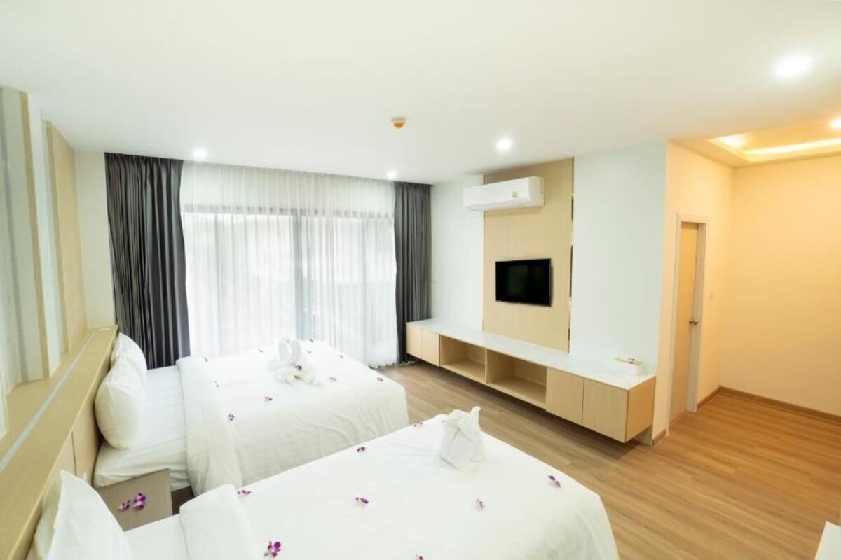 Family Room, Non Smoking, Balcony | Blackout curtains, free WiFi