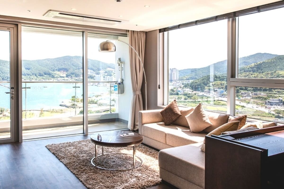 Suite Signature, vistas al mar, en esquina | Zona de estar