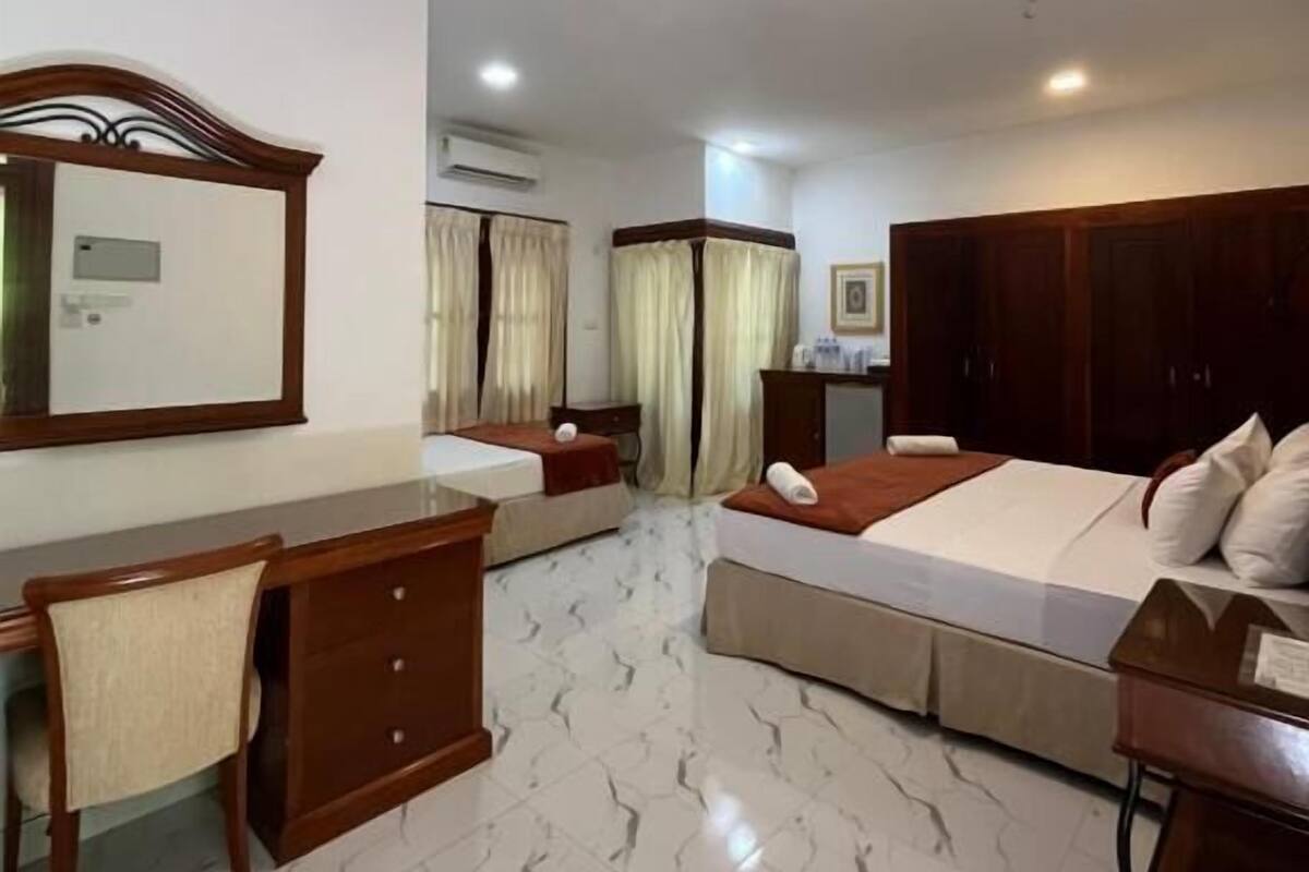 Triple Room, Patio, Poolside | In-room safe, free WiFi