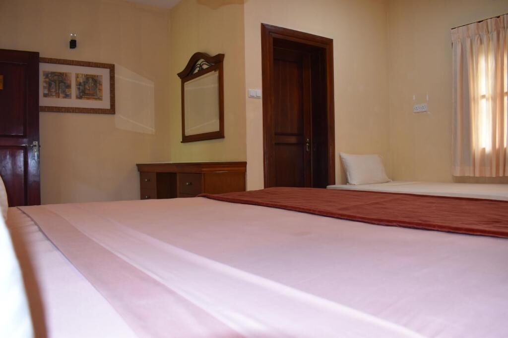 Triple Room, Patio, Poolside | In-room safe, free WiFi