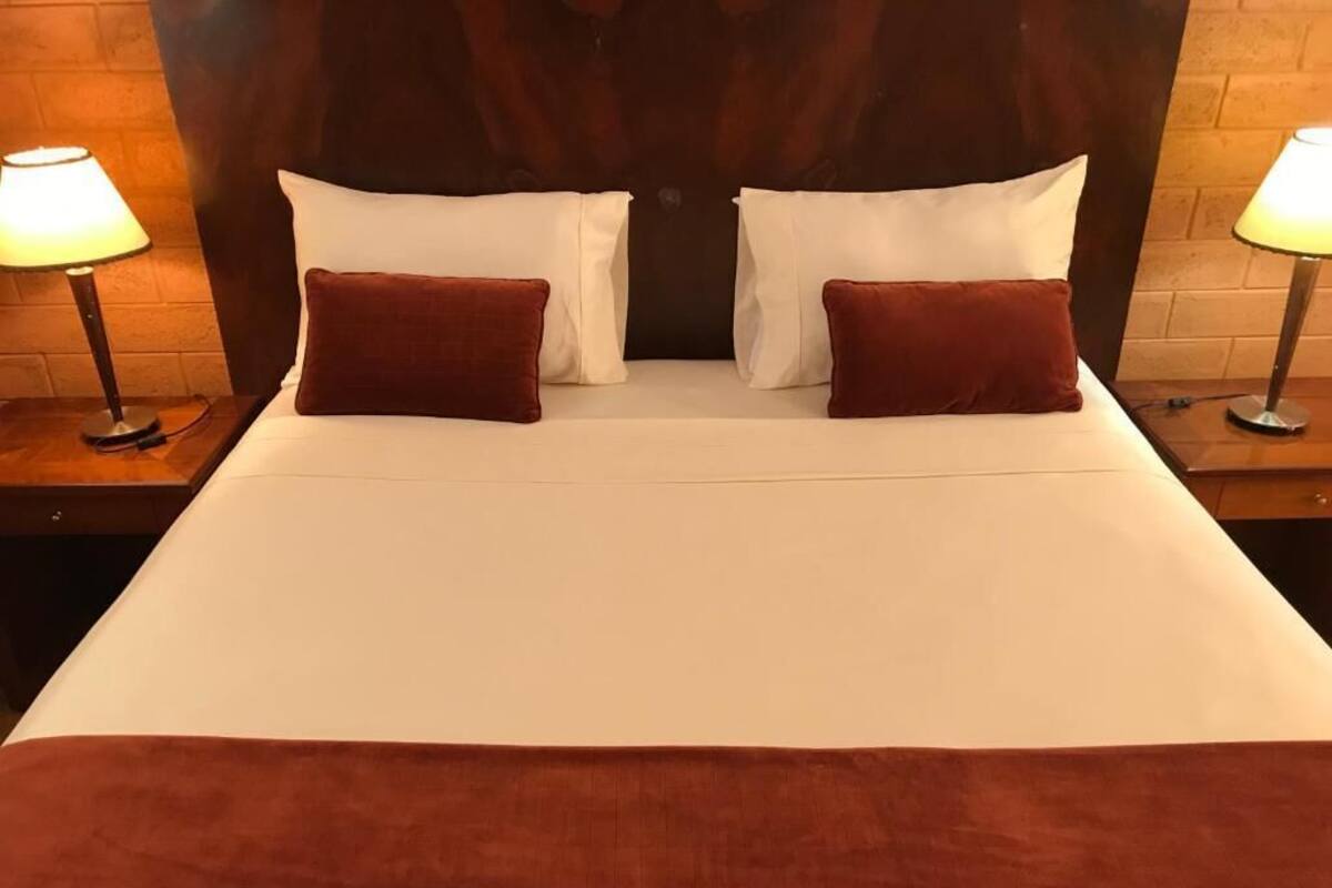 Economy Double Room, Garden View, Poolside | In-room safe, free WiFi