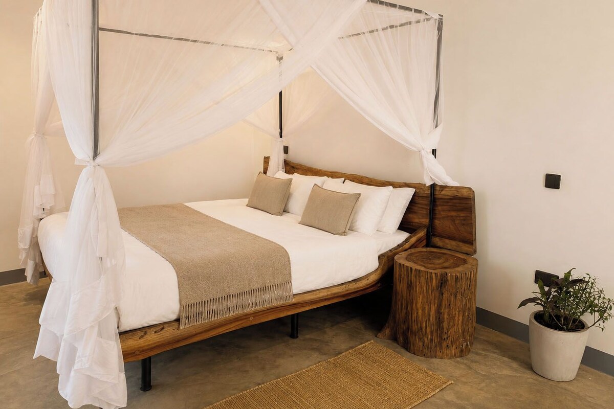 Standard Suite | Premium bedding, in-room safe, iron/ironing board, WiFi (free)