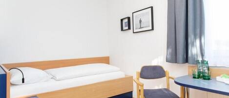 Desk, free WiFi, bed sheets