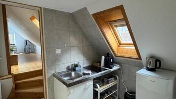 Appartement, balcon, vue ville | Cuisine privée