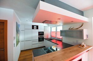 Superior Chalet, Mountain View | Private kitchen | High chair