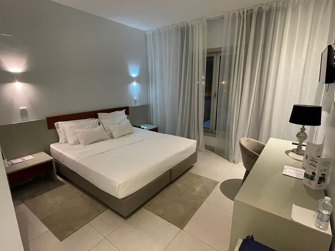 Standard Double Room, Courtyard View | In-room safe, desk, laptop workspace, blackout drapes