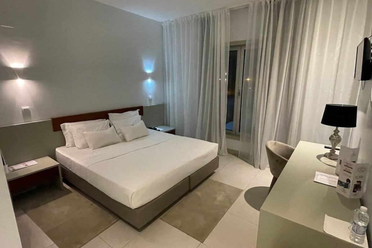 In-room safe, desk, laptop workspace, blackout curtains