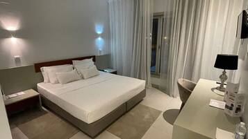 In-room safe, desk, laptop workspace, blackout curtains
