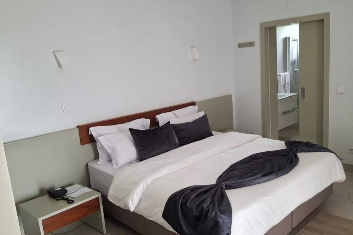 In-room safe, desk, laptop workspace, blackout curtains